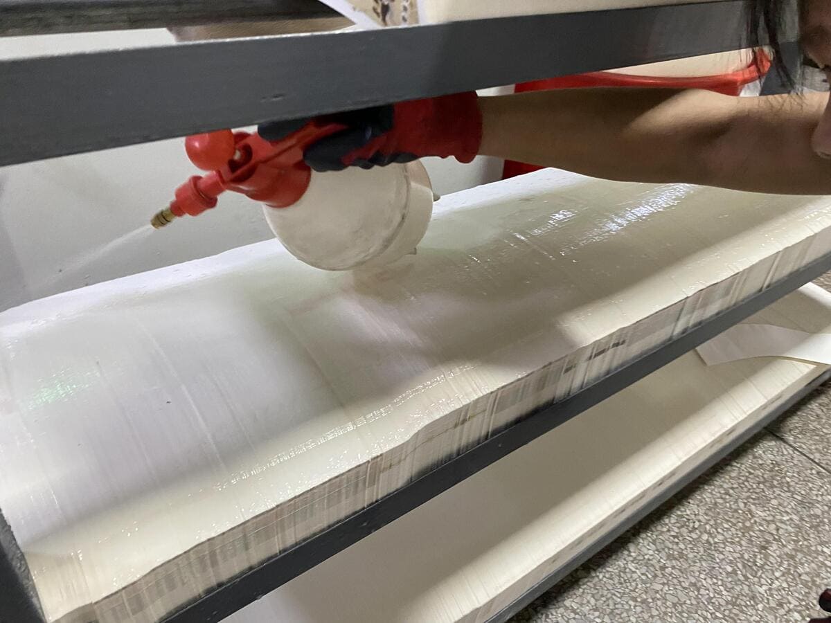 Paper cup fan sprays water